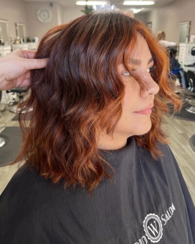 Spring Blooms: Refreshing Hair Color Trends red hair coloring castro valley Studio W