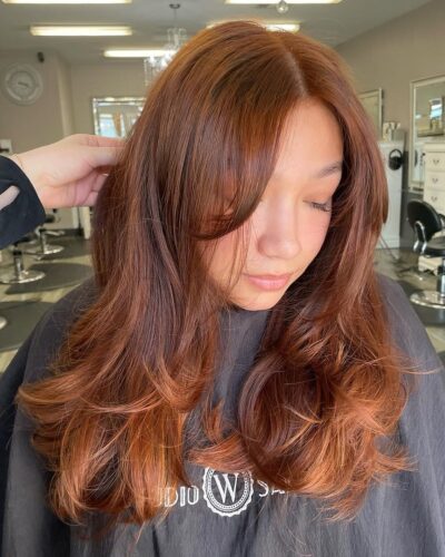 Spring Blooms: Refreshing Hair Color Trends red hair coloring castro valley Studio W